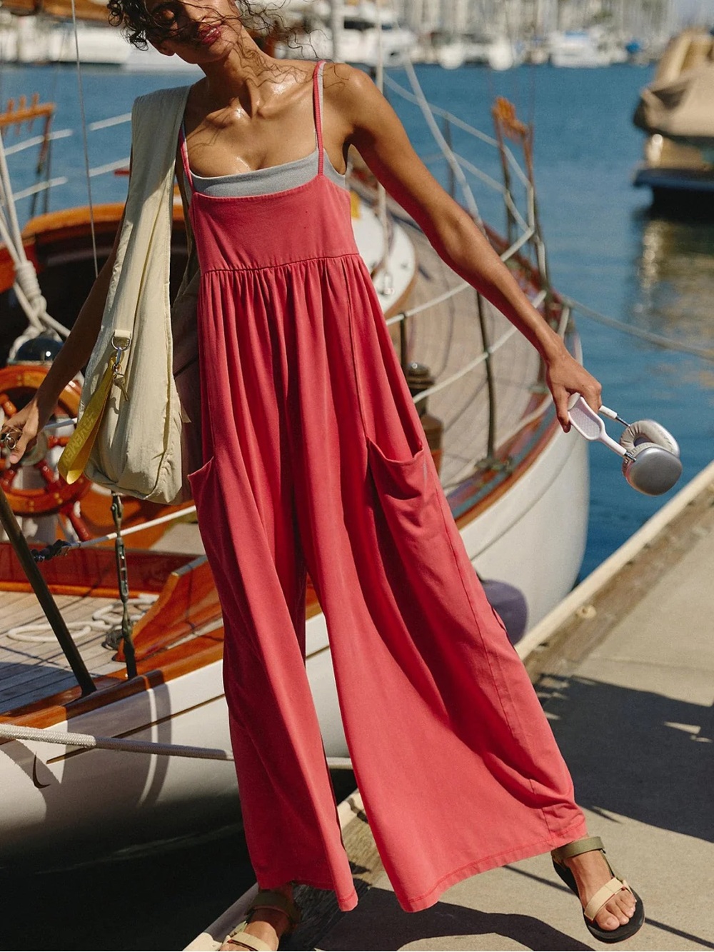 FP Movement Hot Shot Strappy Onesie by Free People in Grapefruit